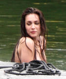 Sexy young starlet Megan Fox goes topless during a scene from the thriller Jennifer's Body shooting in Vancouver.  Fox has some plastic coverings on her nipples as she emerges from the water