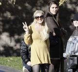 Lindsay Lohan in yellow dress and black stockings in Orem, Utah