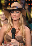 Denise Richards shows cleavage at MTV’s Total Request Live