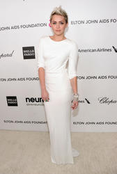 th_773193536_miley_cyrus_at_the_21st_annual_elton_john_aids_foundation_viewing_party_10_122_65lo.jpg